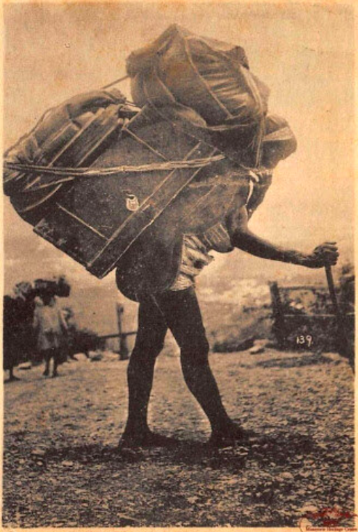Coolie carrying luggage from Rajpur to Mussoorie image circa 1920s Image from Mussoorie Heritage Centre archives.